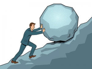 Pushing a boulder uphill